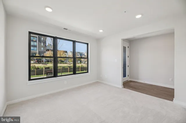 a bathroom with a sink a mirror and vanity