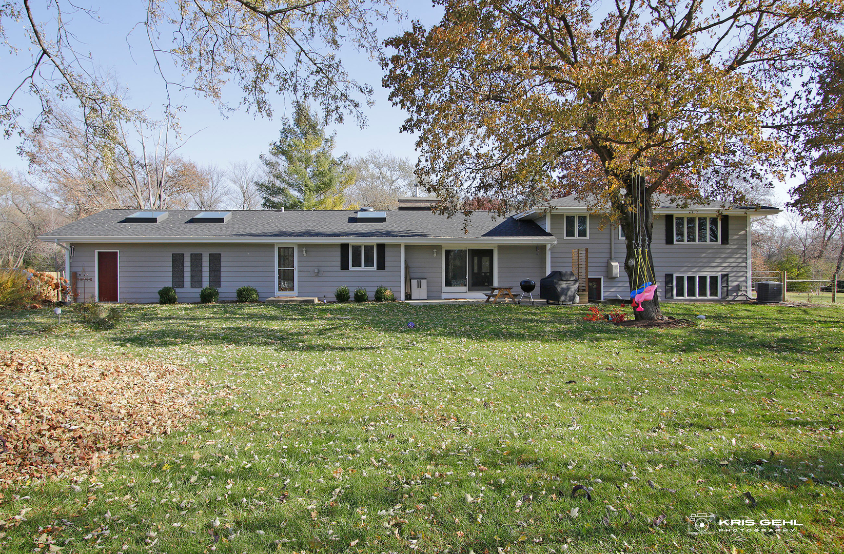 21624 North Harbor Road Barrington, IL 60010 - Photo 2 of 2 a front view of a house with a yard and trees