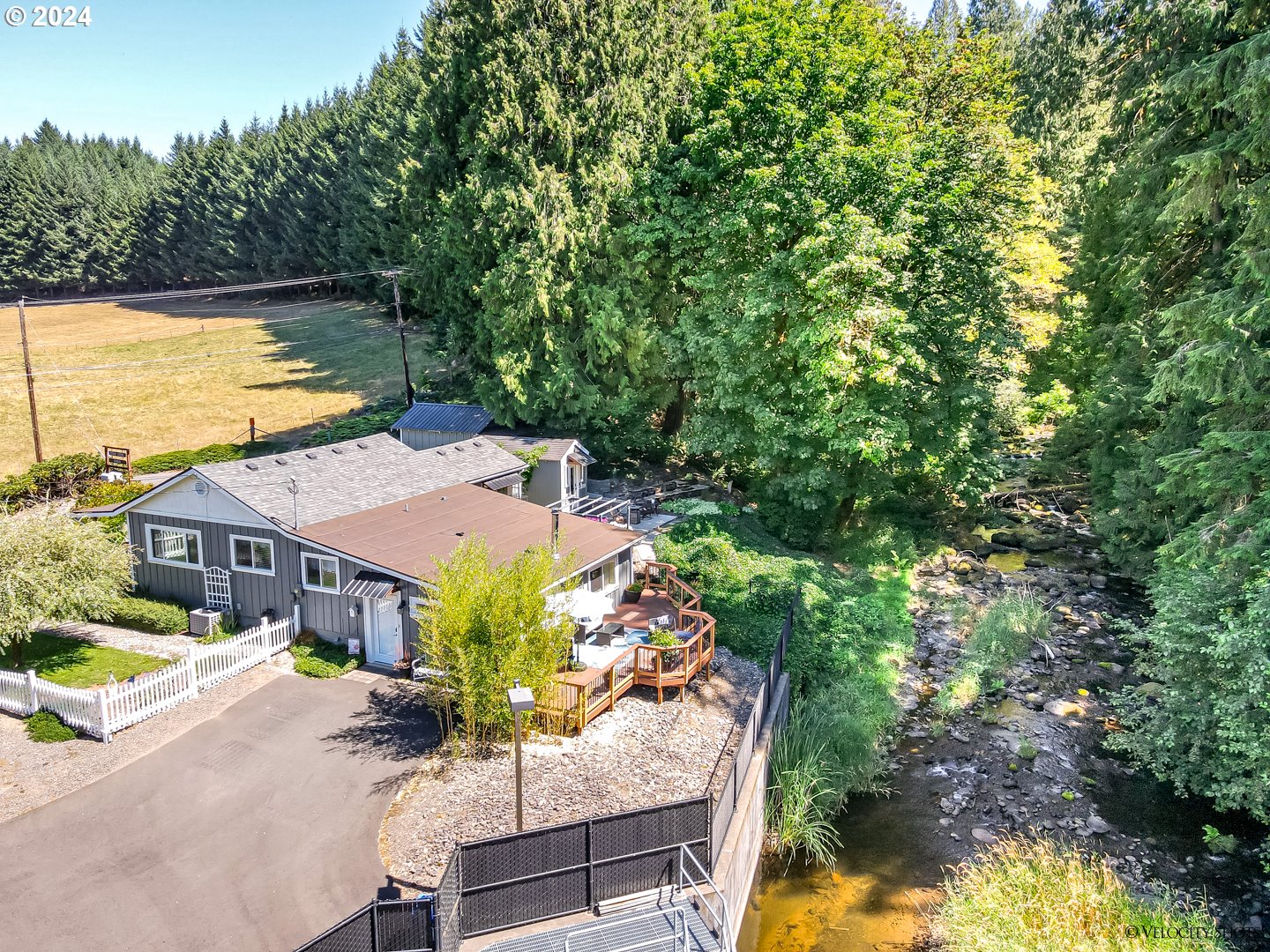 40170 Southeast Fish Hatchery Road Sandy, OR 97055 - Photo 27 of 30 an aerial view of a house with swimming pool and large trees