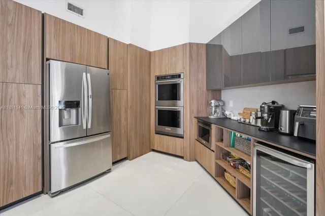 a kitchen with a stove and a microwave