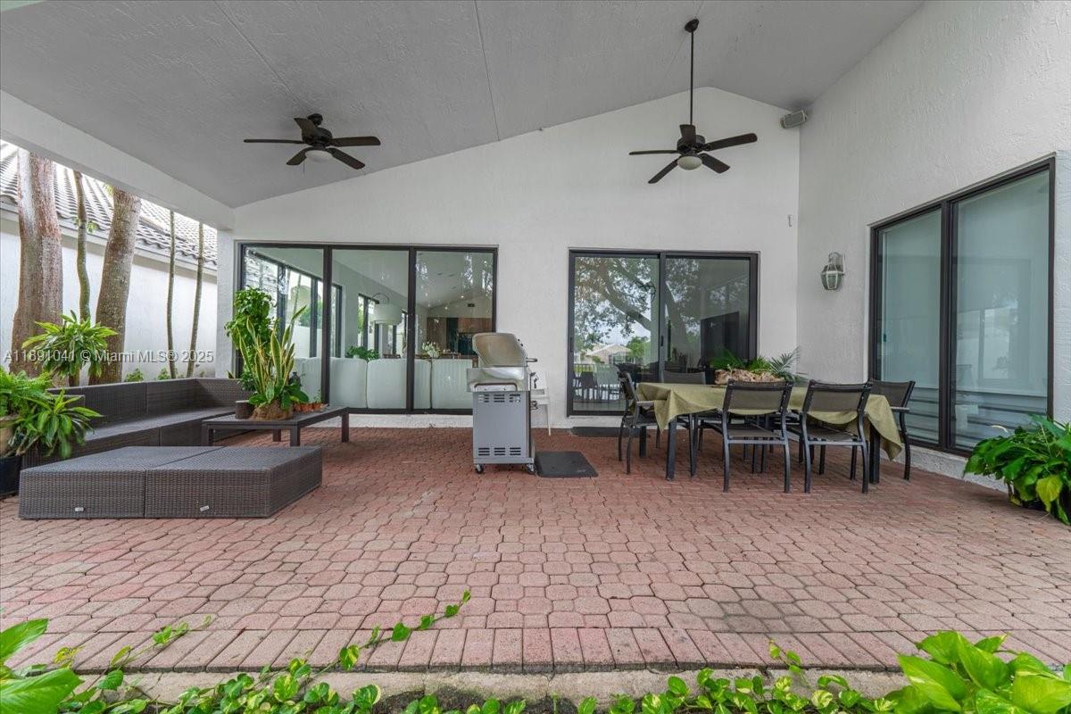 1441 154th Avenue Pembroke Pines, FL 33027 - Photo 32 of 37 a view of a livingroom with furniture window and outside view