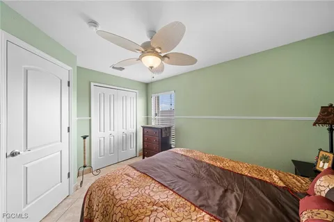 a view of swimming pool with outdoor seating and plants