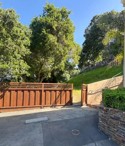 a view of swimming pool with a patio
