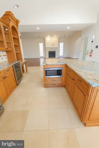 a large en suite bathroom with a double vanity sink and a mirror