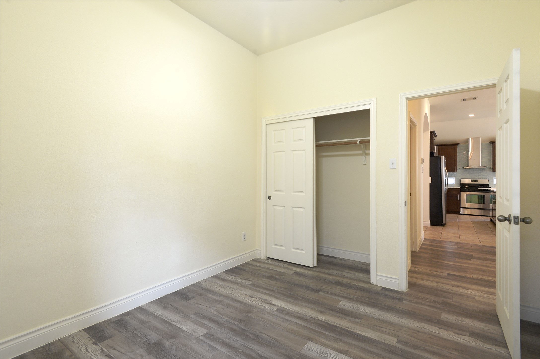 2129 Dry Tortugas Trail Austin, TX 78747 - Photo 17 of 38 a view of a hallway with wooden floor