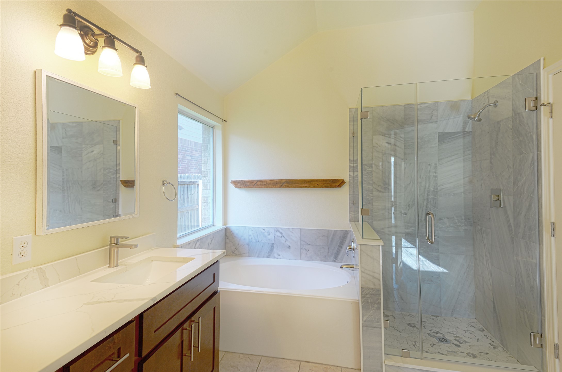 2129 Dry Tortugas Trail Austin, TX 78747 - Photo 28 of 38 a bathroom with a sink and a mirror