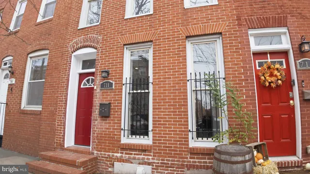 a front view of a house with a glass door