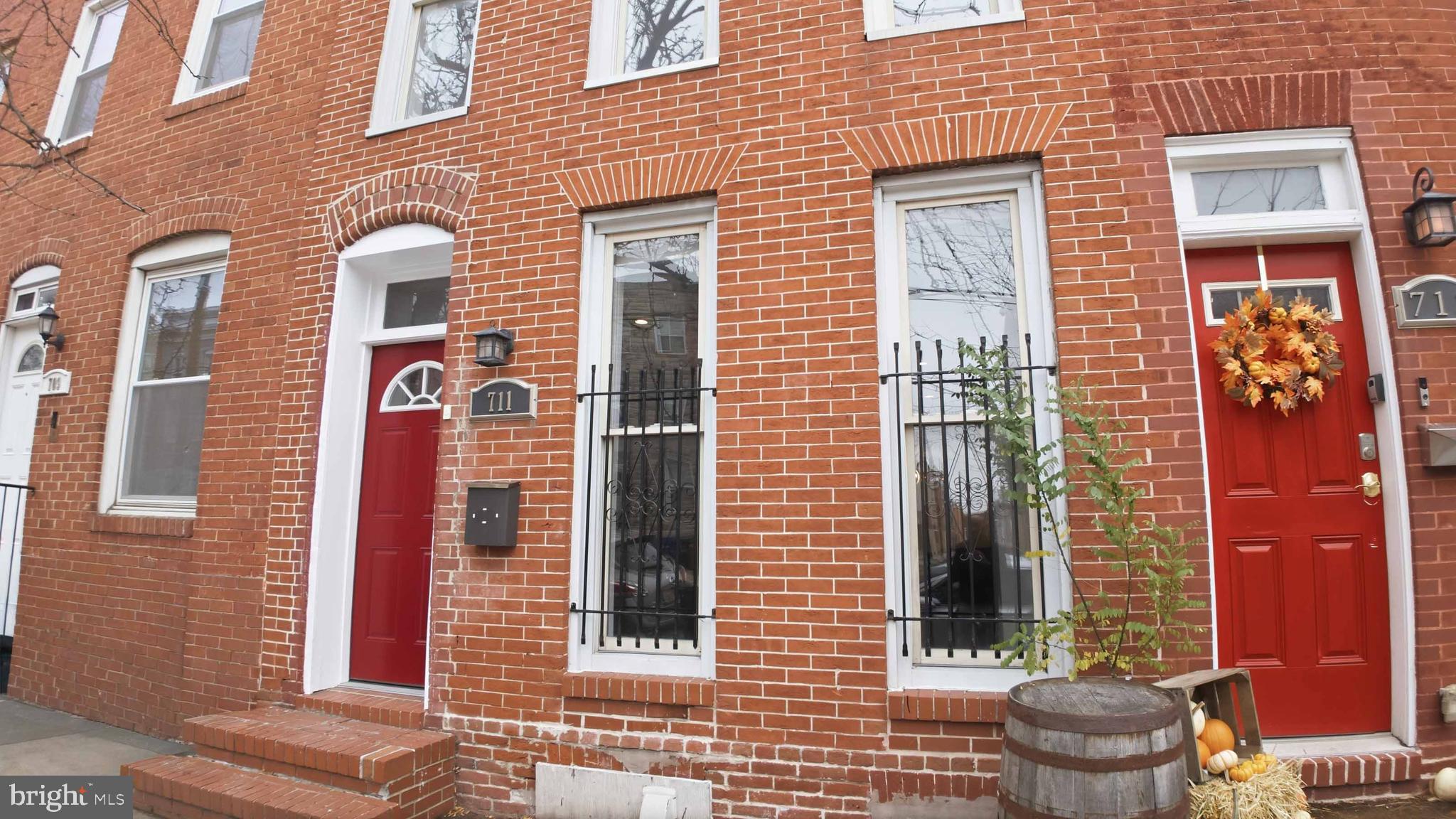 a front view of a house with a glass door