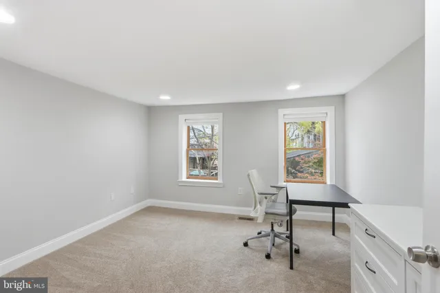 a bathroom with a shower and a toilet