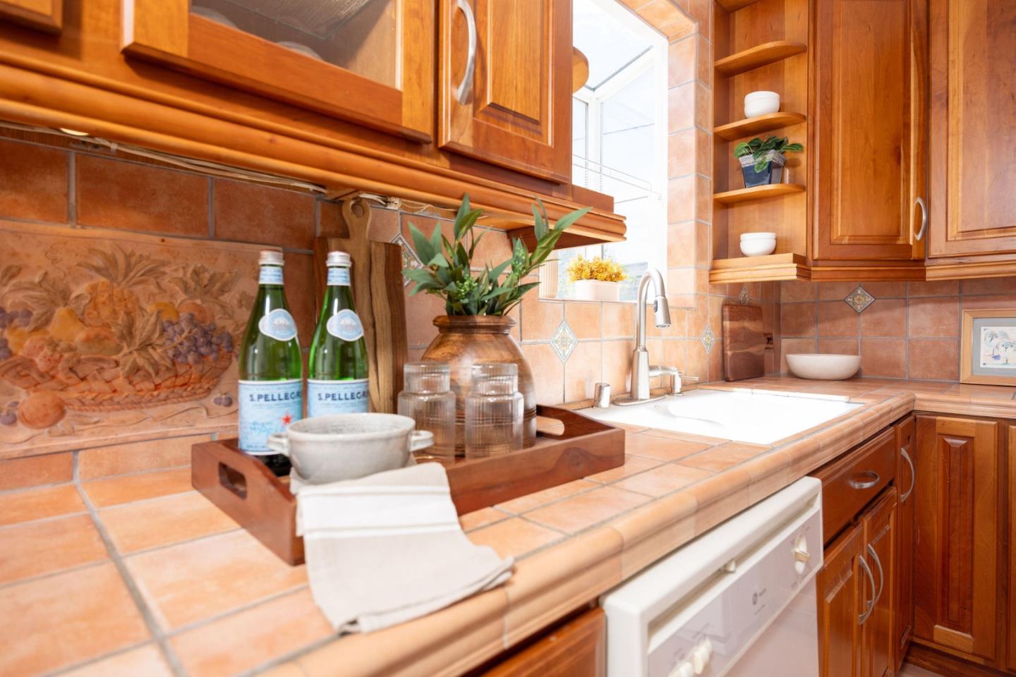 304 Nelson Avenue Pacifica, CA 94044 - Photo 16 of 39 a view of a kitchen with a large window and furniture