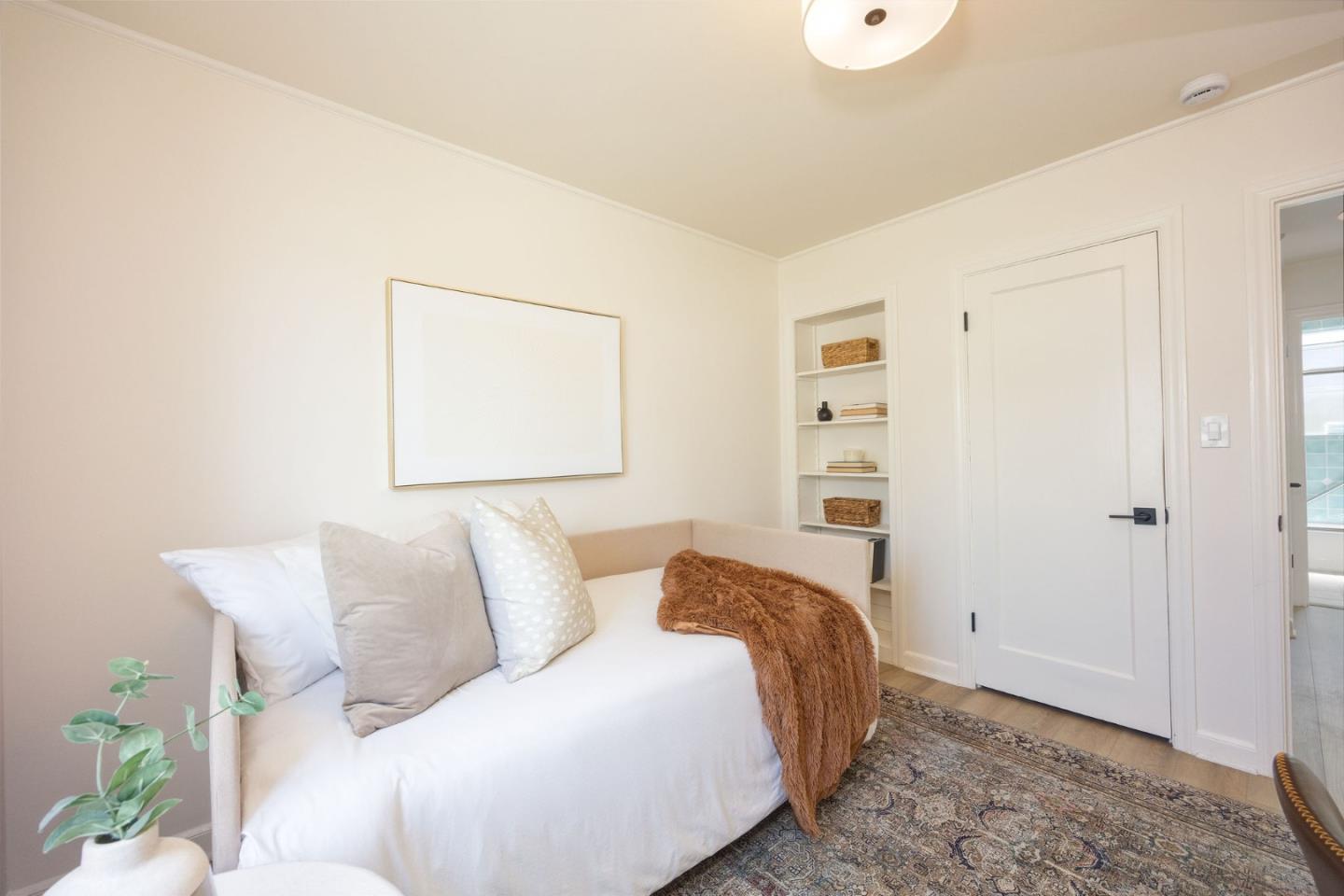 304 Nelson Avenue Pacifica, CA 94044 - Photo 27 of 39 a bed room with a bed and a painting