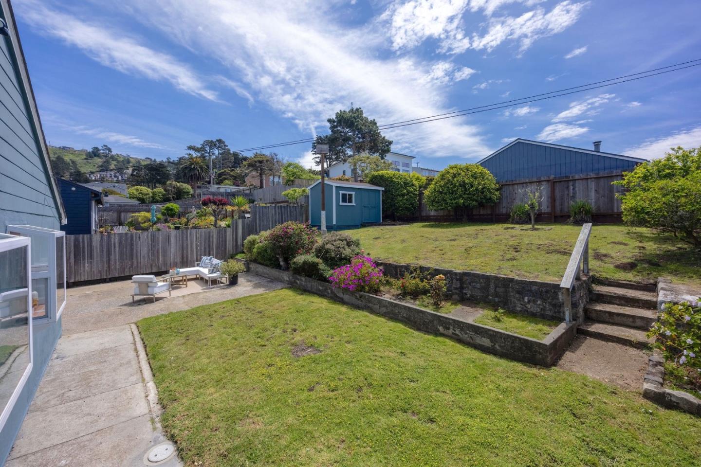 304 Nelson Avenue Pacifica, CA 94044 - Photo 30 of 39 a view of a backyard with sitting area