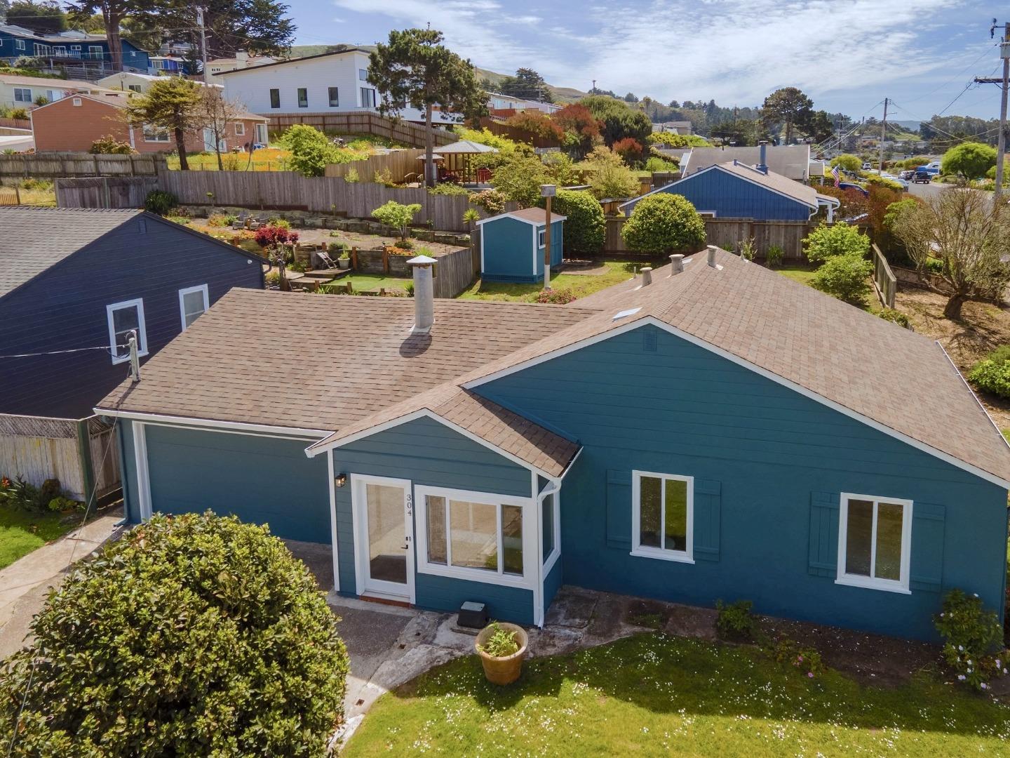 304 Nelson Avenue Pacifica, CA 94044 - Photo 3 of 39 a aerial view of a house with yard porch and furniture