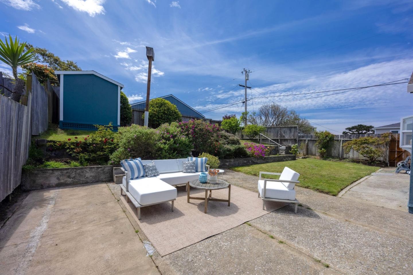 304 Nelson Avenue Pacifica, CA 94044 - Photo 31 of 39 a house view with a sitting space and garden