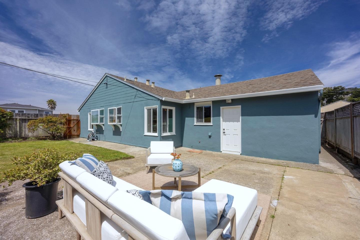 304 Nelson Avenue Pacifica, CA 94044 - Photo 33 of 39 a view of a house with backyard and furniture
