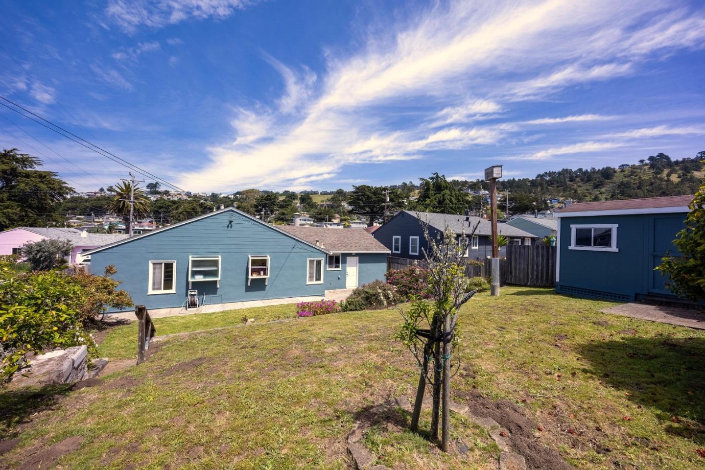 304 Nelson Avenue Pacifica, CA 94044 - Photo 34 of 39 a view of a house with a yard