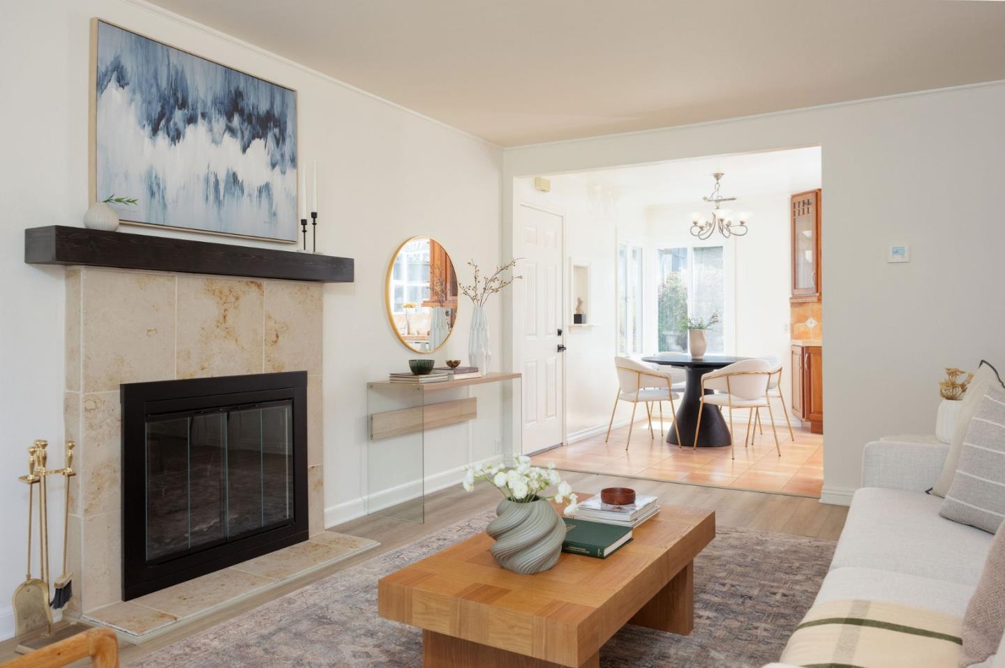 304 Nelson Avenue Pacifica, CA 94044 - Photo 10 of 39 a living room with furniture and a fireplace