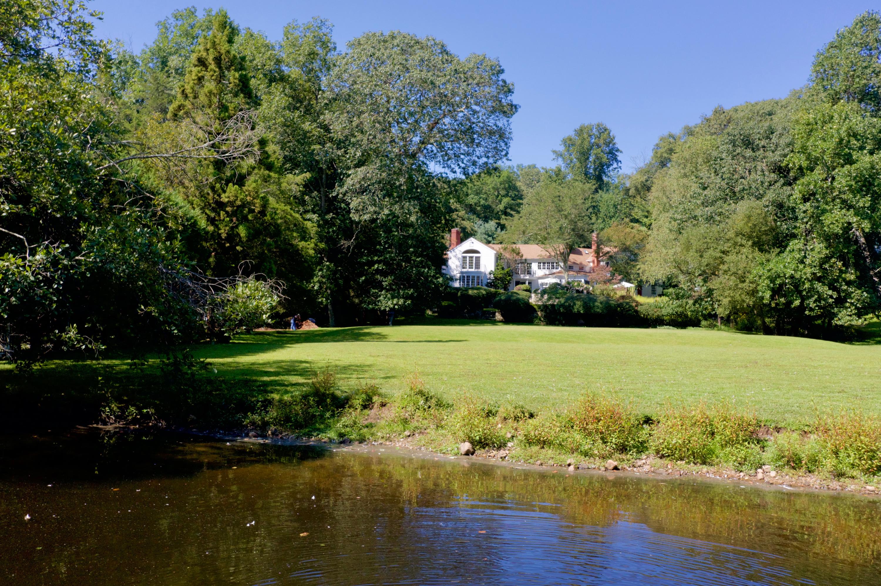 41 Rippowam Road New Canaan, CT 06840 - Photo 4 of 42 a view of a lake with a house
