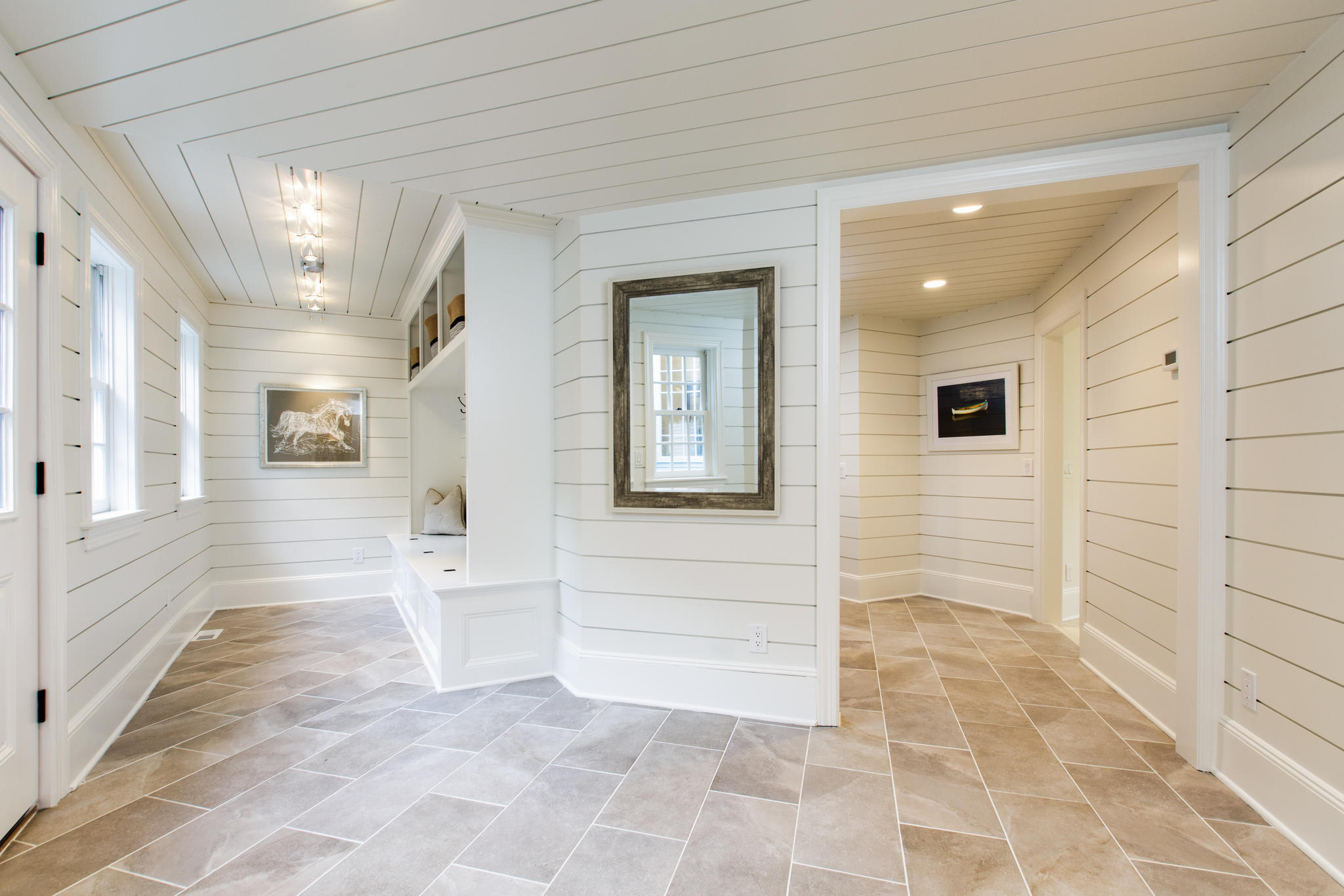 41 Rippowam Road New Canaan, CT 06840 - Photo 8 of 42 a view of a hallway with wooden floor and a bathroom