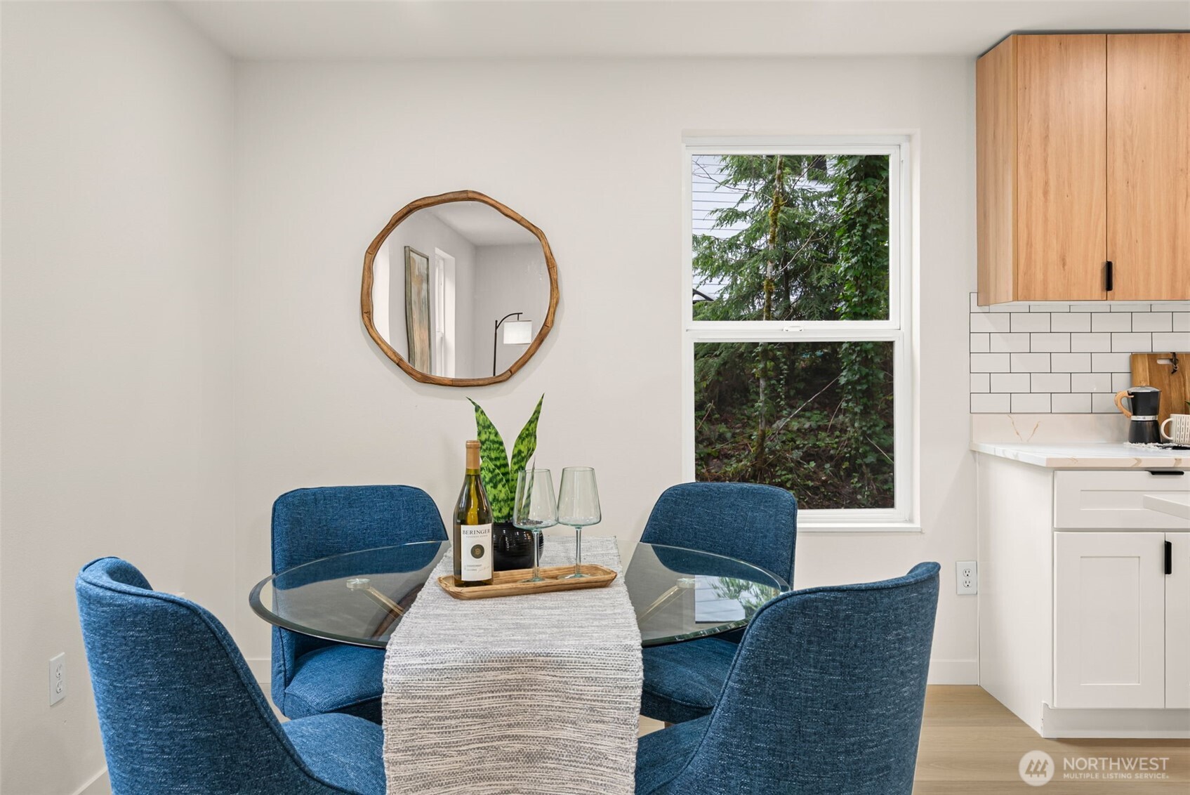 7605 Northeast Hidden Cove Road Bainbridge Island, WA 98110 - Photo 6 of 39 a living room with furniture and a window