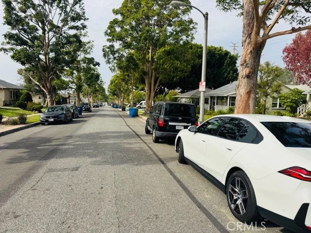 a view of a street with houses