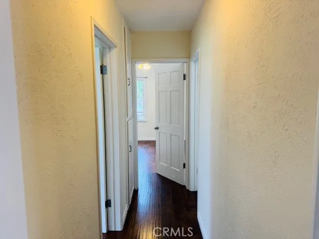 a bathroom with a sink a mirror and vanity