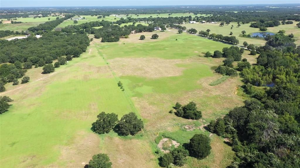 1749 St Sunset Tx 76270 Sunset, TX 76270 - Photo 4 of 6 a view of a lake with a mountain