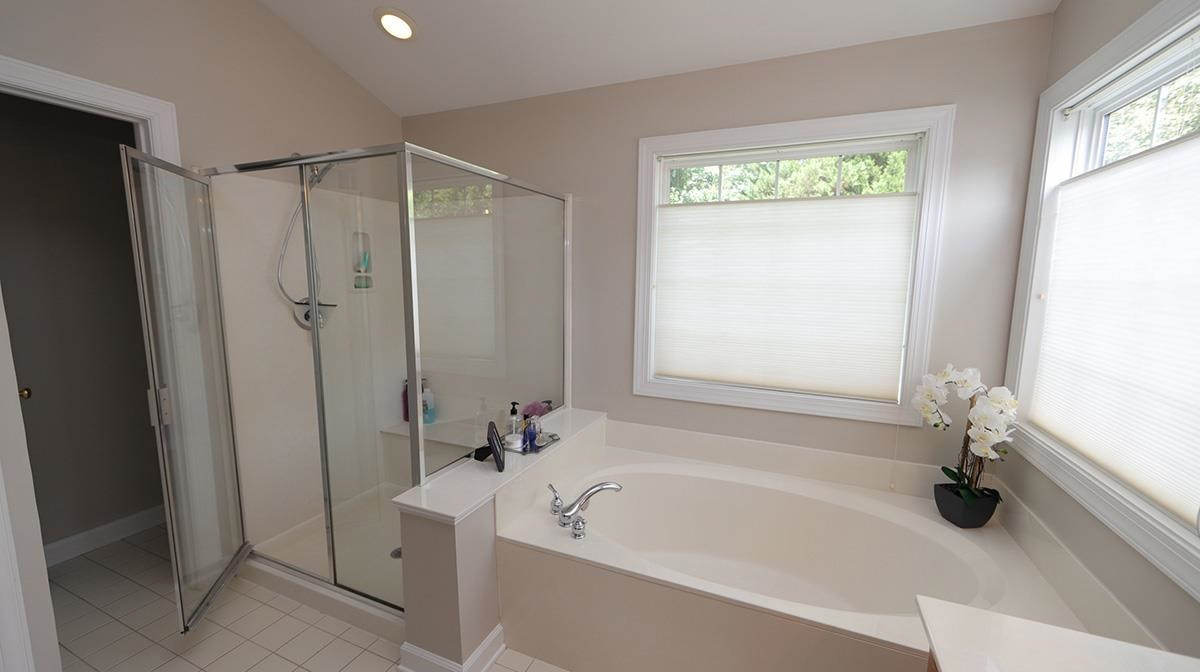 10705 Chesson Drive Raleigh, NC 27614 - Photo 21 of 30 Bathroom has a large garden tub, separate walk-in shower and a water closet. Owner's Bathroom