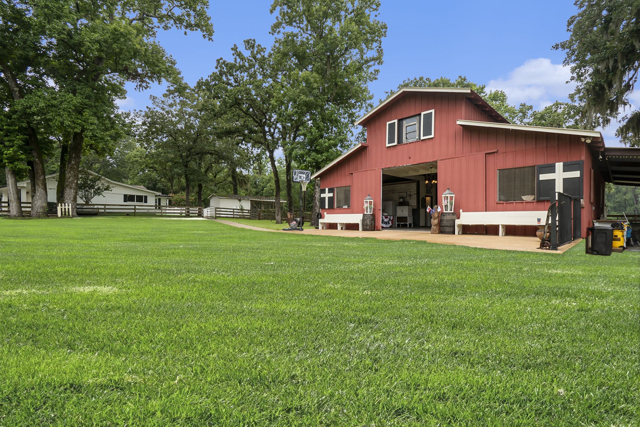 7363 County Line Road Willis, TX 77378 - Photo 28 of 34 Charming barn with versatile converted stalls, easily adaptable to your needs.