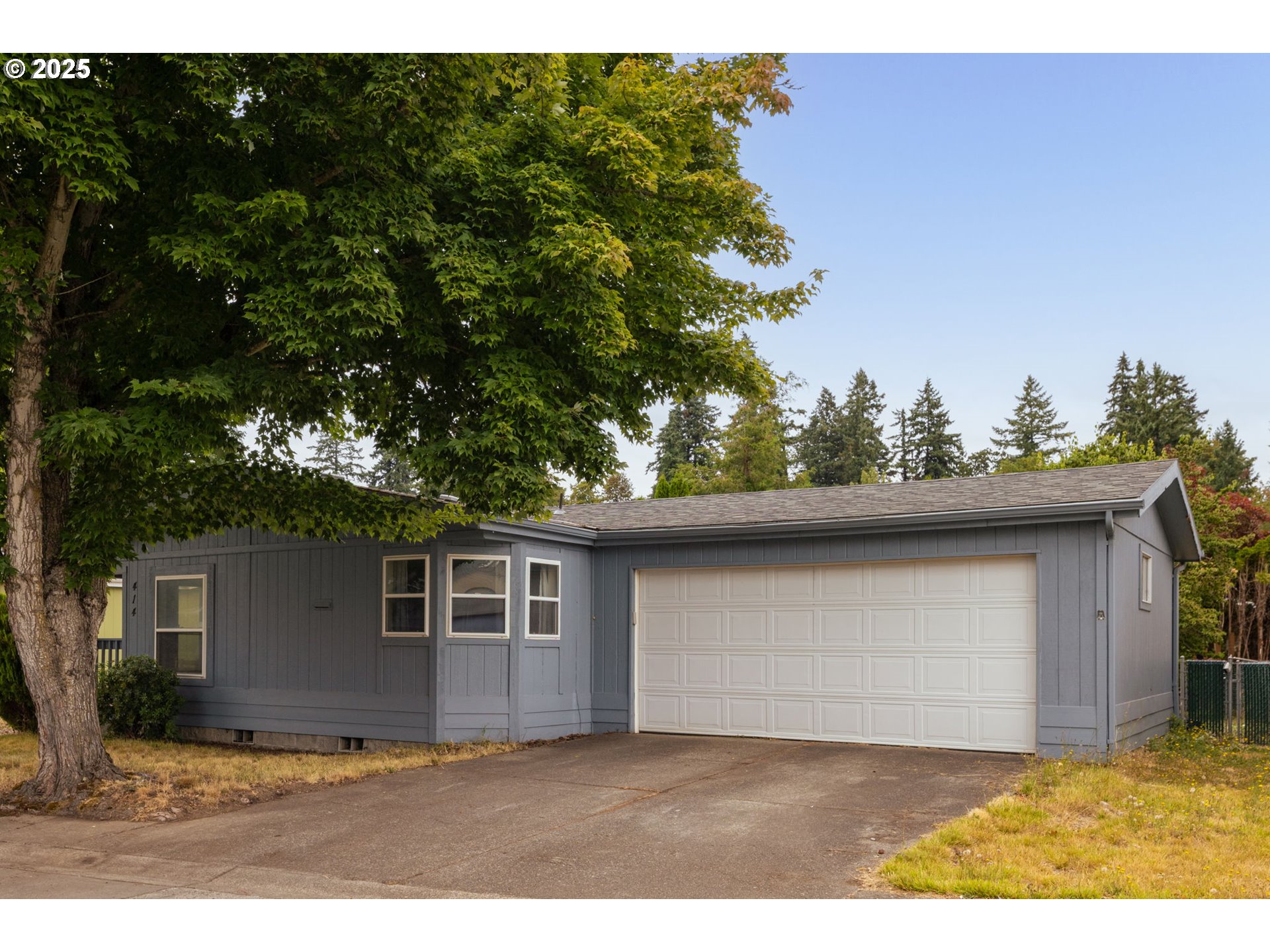 1655 South Elm Street Canby, OR 97013 - Photo 2 of 32 a view front of house with yard