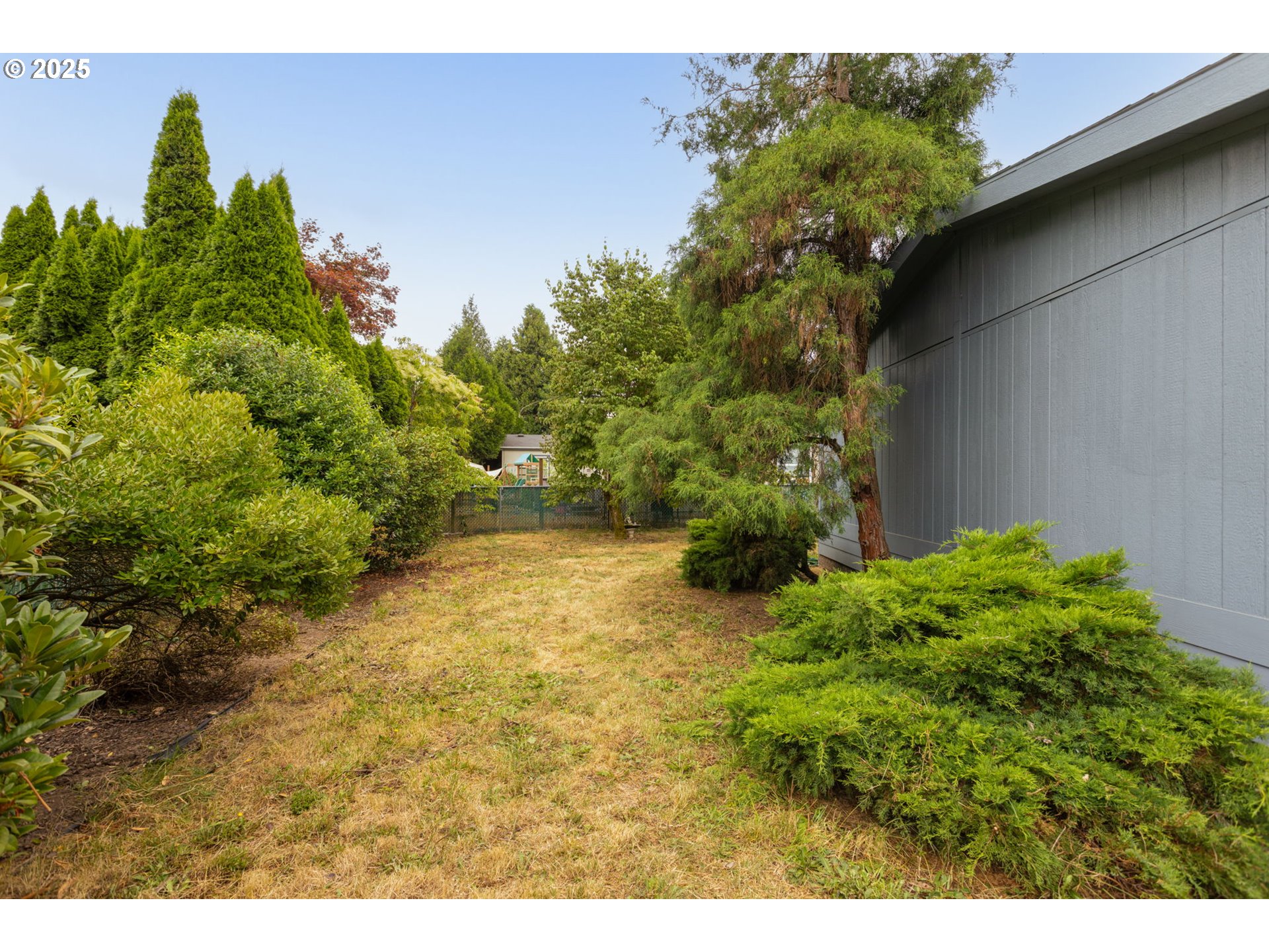 1655 South Elm Street Canby, OR 97013 - Photo 31 of 32 a view of a yard