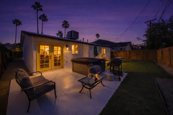a building outdoor space with patio furniture