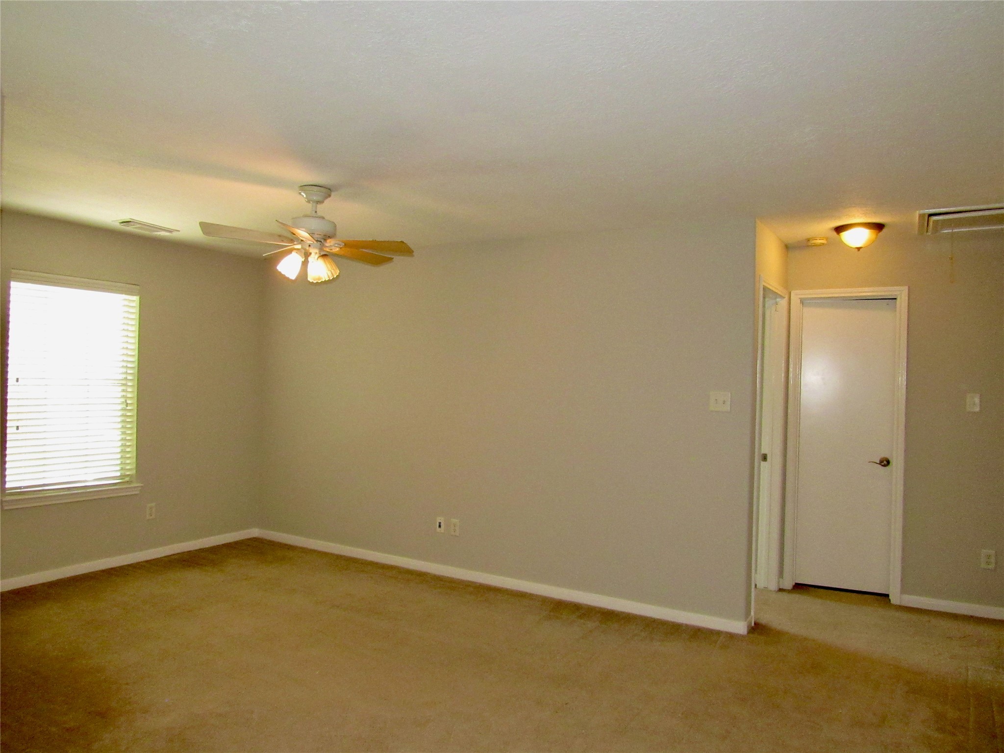 3231 Stoneydale Lane Spring, TX 77388 - Photo 6 of 16 an empty room with chandelier fan