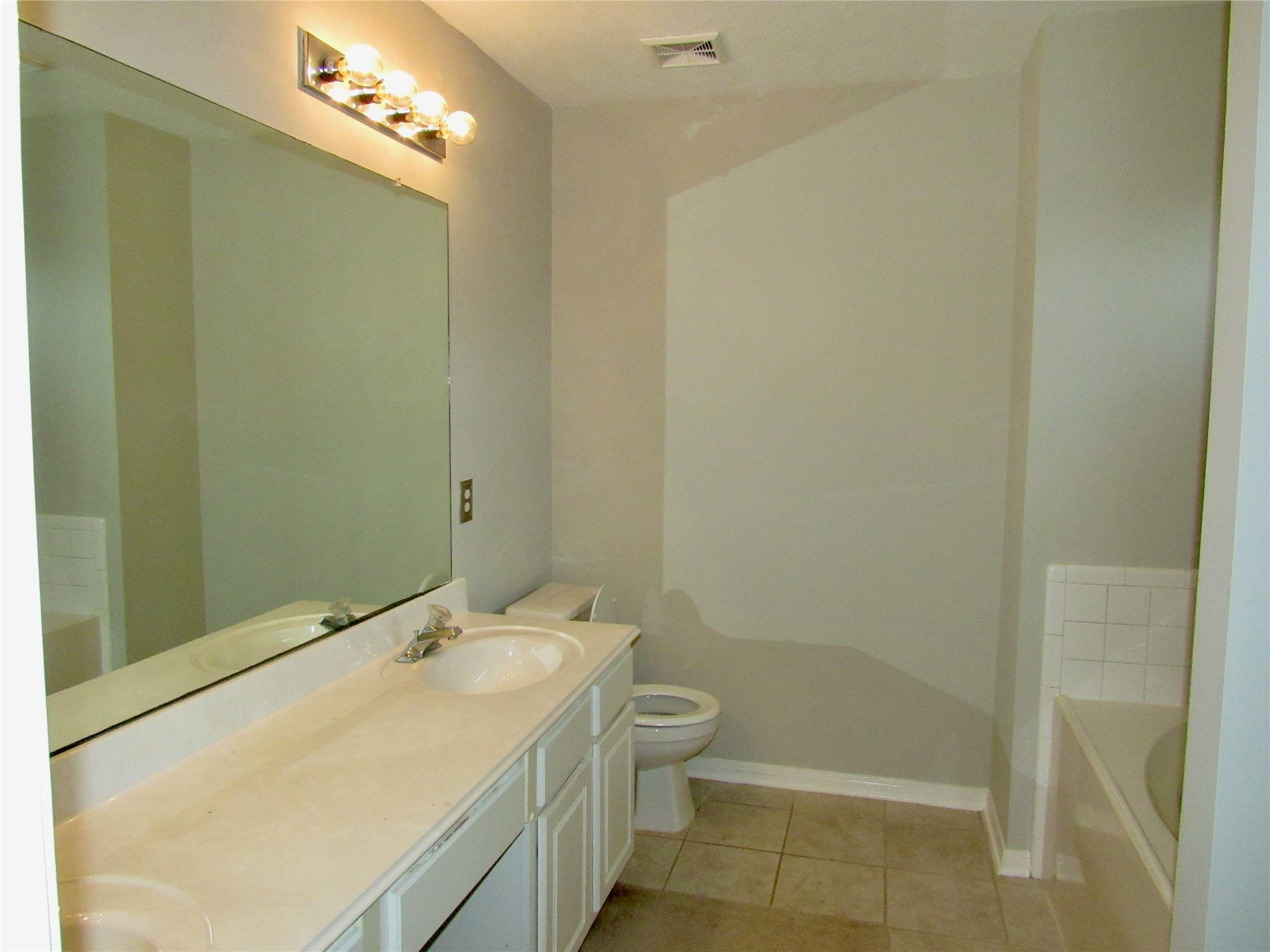 3231 Stoneydale Lane Spring, TX 77388 - Photo 9 of 16 a bathroom with a sink a toilet and shower