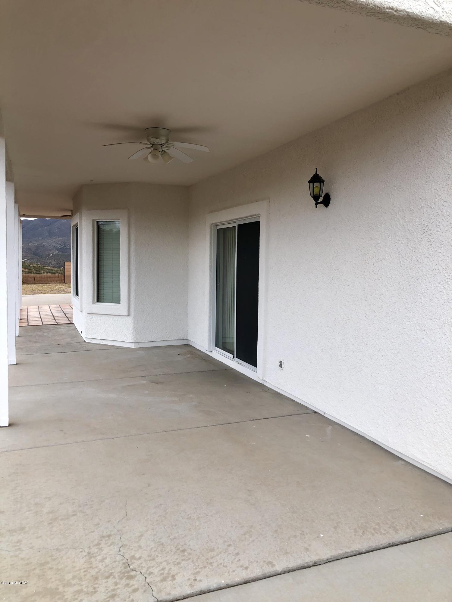 1435 Circulo Sombrero Rio Rico, AZ 85648 - Photo 34 of 40 a view of an empty room with a window