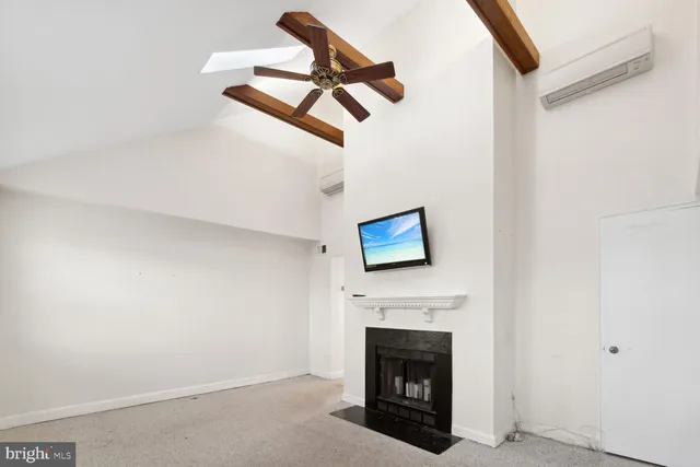 a living room with a fireplace