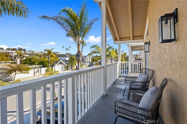 a view of balcony with furniture