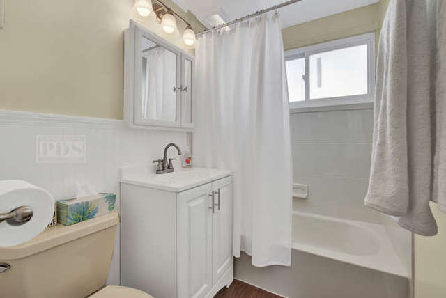 770 Spring Road Elmhurst, IL 60126 - Photo 20 of 35 a bathroom with a sink toilet and shower