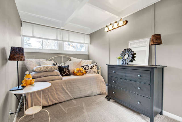 770 Spring Road Elmhurst, IL 60126 - Photo 22 of 35 a bedroom with a bed and window