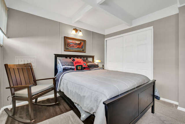 770 Spring Road Elmhurst, IL 60126 - Photo 24 of 35 a bedroom with a bed and a dresser in it
