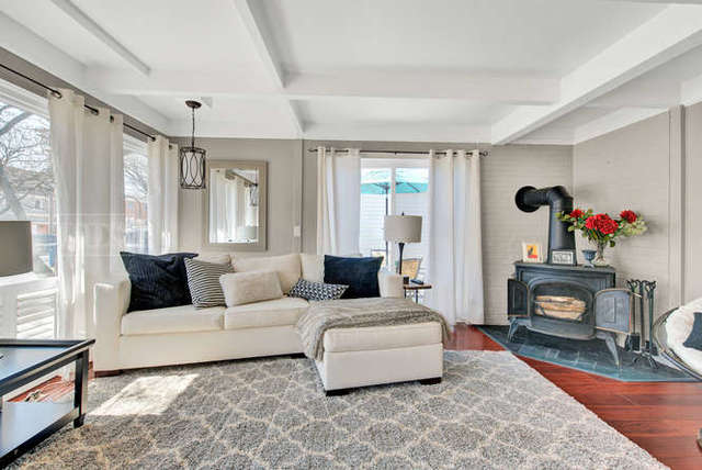 770 Spring Road Elmhurst, IL 60126 - Photo 6 of 35 a living room with furniture and a fireplace