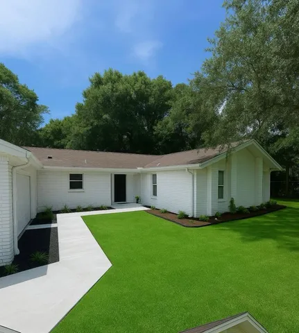 a house view with a garden space