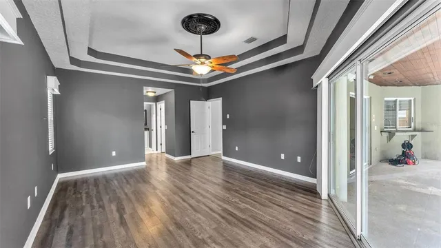 a bathroom with a double vanity sink a mirror and a bathtub