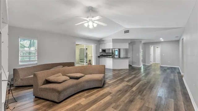 a view of an empty room with a window