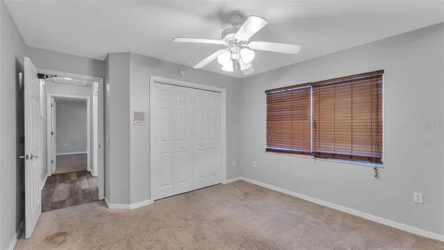 a view of a garden with a bench in patio