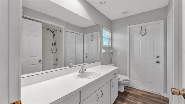 a side view of a house with a yard