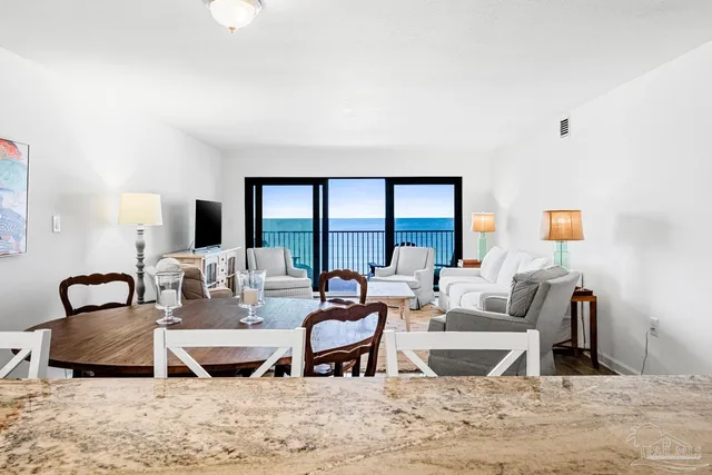 a kitchen with stainless steel appliances a refrigerator sink and cabinets