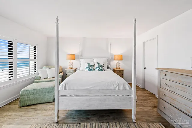 a bathroom with a shower and a toilet