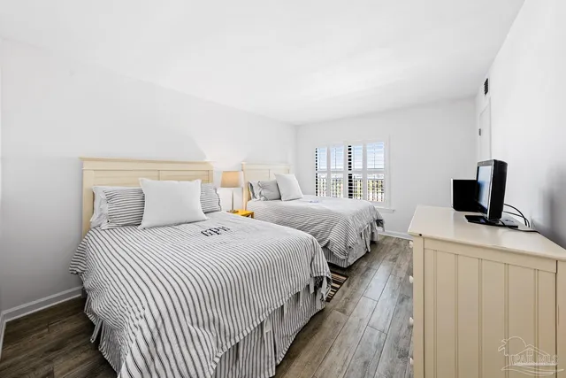 a bathroom with a toilet and shower