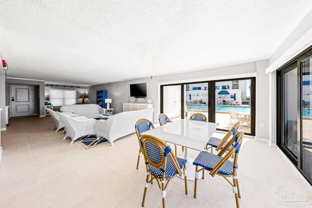 a view of a balcony with wooden floor